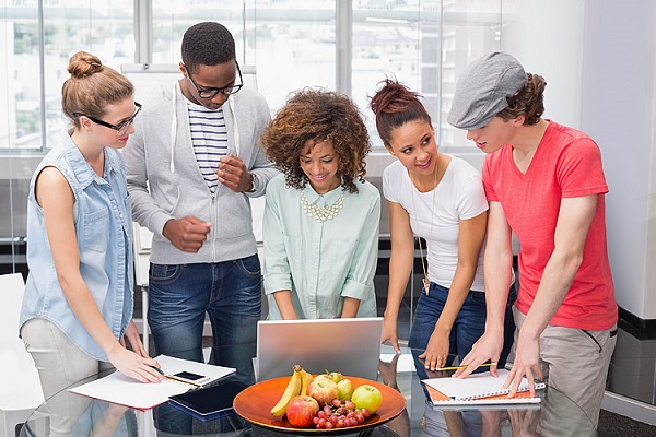 An Image of A Group of Students Discussing with each other.