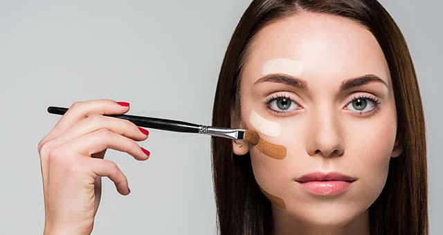 Image Showing A Young Woman Applying Various Face Creams To Know Her Skin Type.